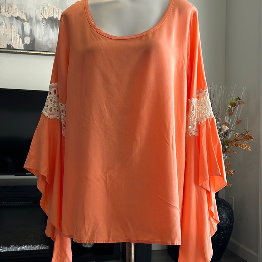 Altar’s state top with flare sleeves